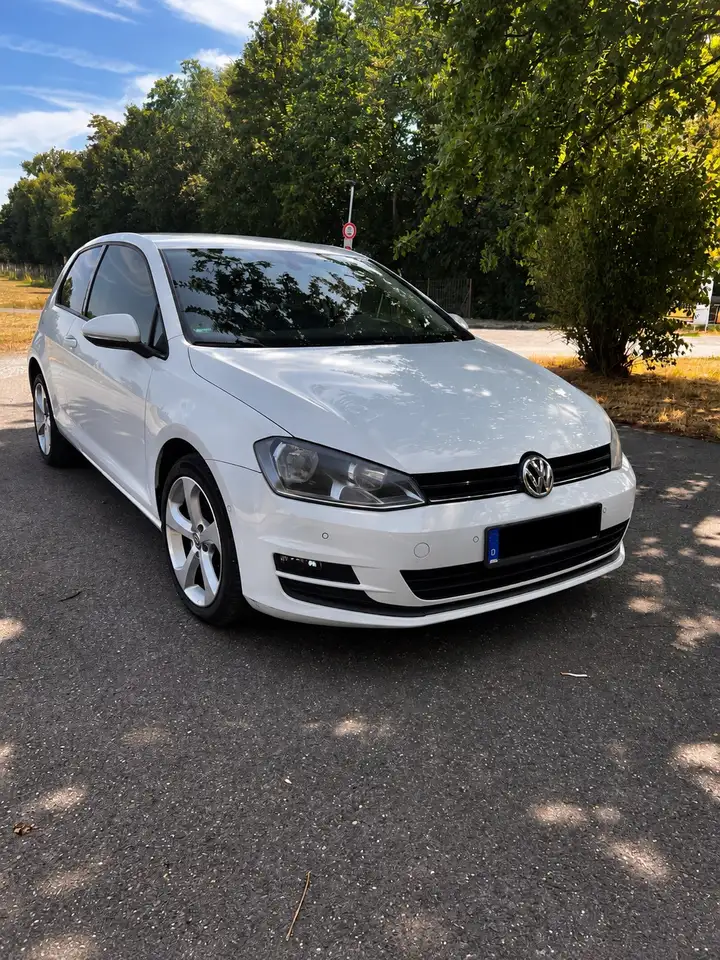 Volkswagen Golf 1.2 TSI Comfortline — photo 1 of 14