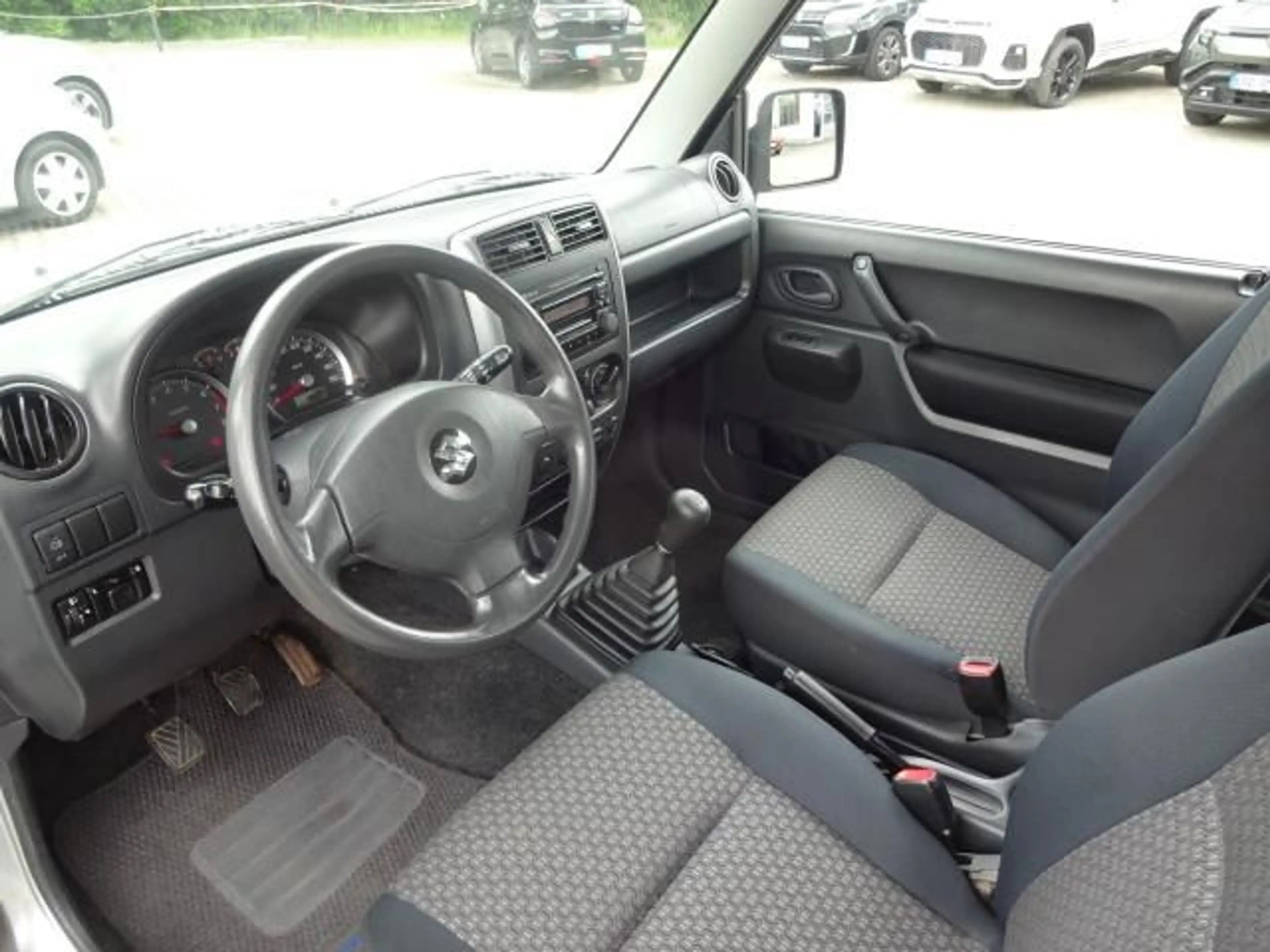 Suzuki Jimny JIMNY 1.3 M/T 4X4 COMFORT KLIMA ALLRAD AHZV CD — photo 11