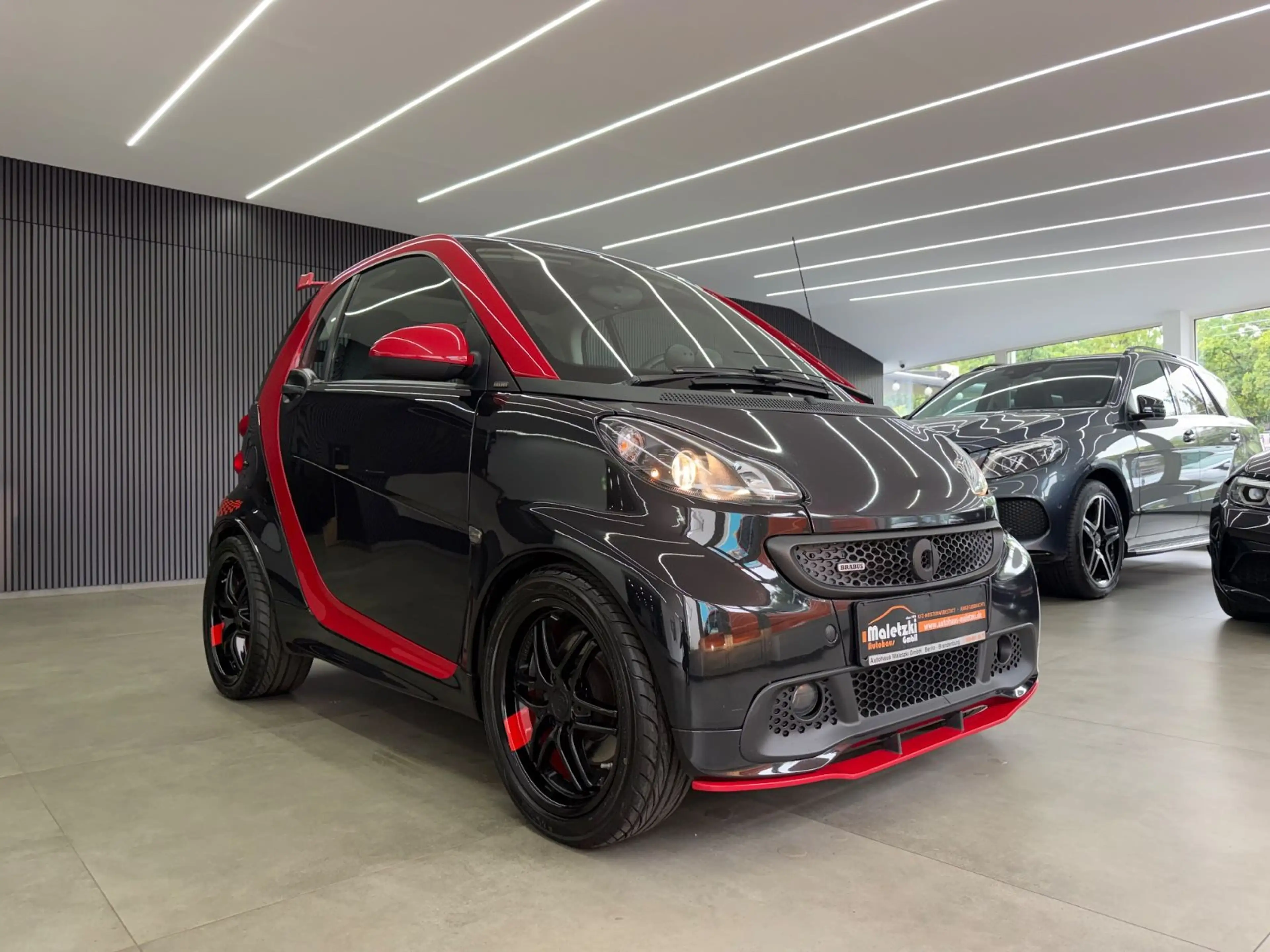 smart forTwo 1.0 coupe Brabus*Panorama*Navi*Sitzheiz* — photo 28