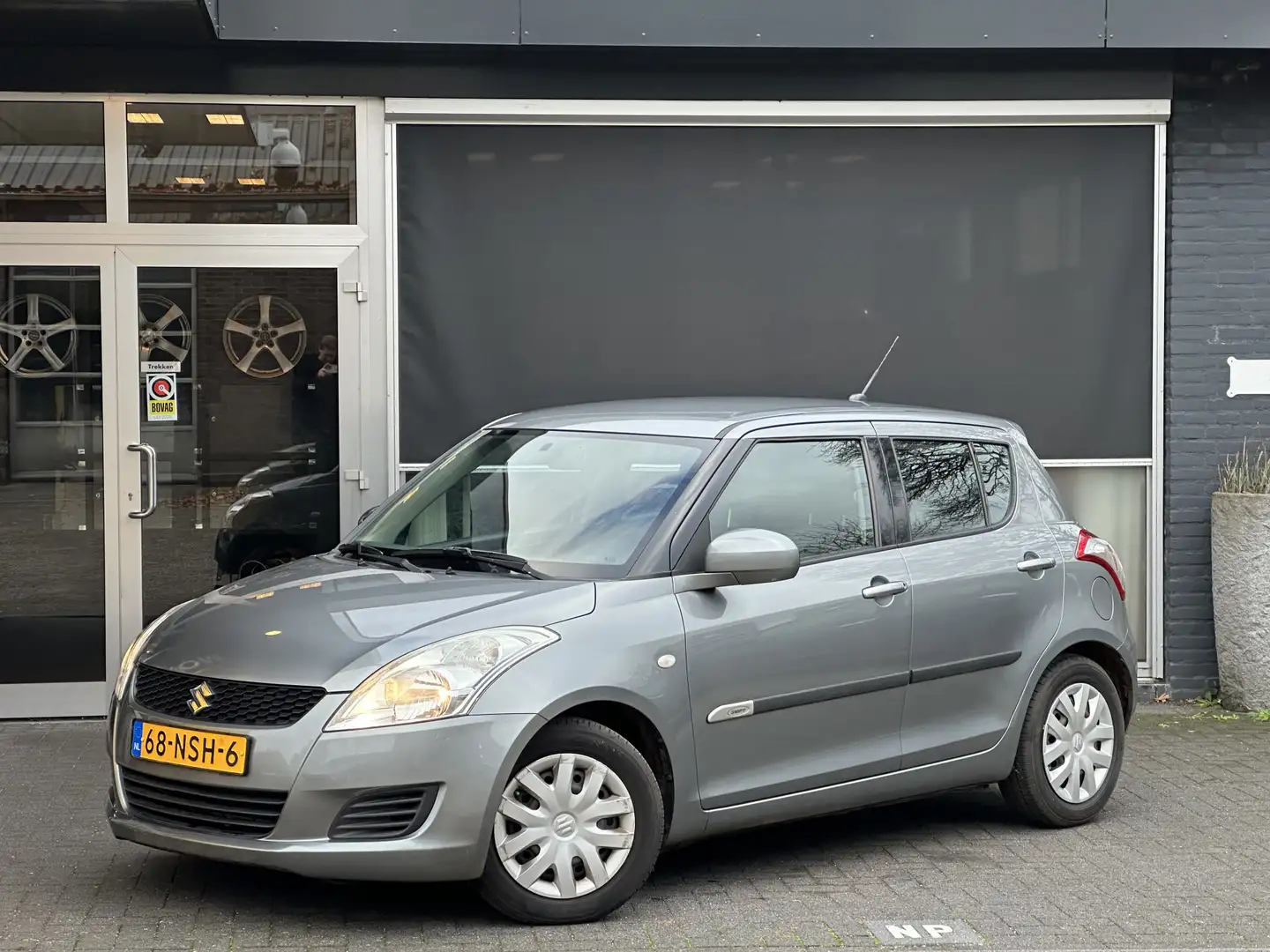 Suzuki Swift 1.2 Comfort 1e EIGENAAR / AUTOMAAT / AIRCO / STOEL Gris - 1