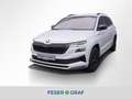 Skoda Karoq Sportline 2,0 l TSI DSG *RFK SHZ MATRIX* Weiß - thumbnail 1