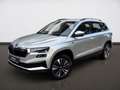 Skoda Karoq Tour 1.5 TSI 110 KW DSG Navi AHK Fahrassis Silber - thumbnail 2