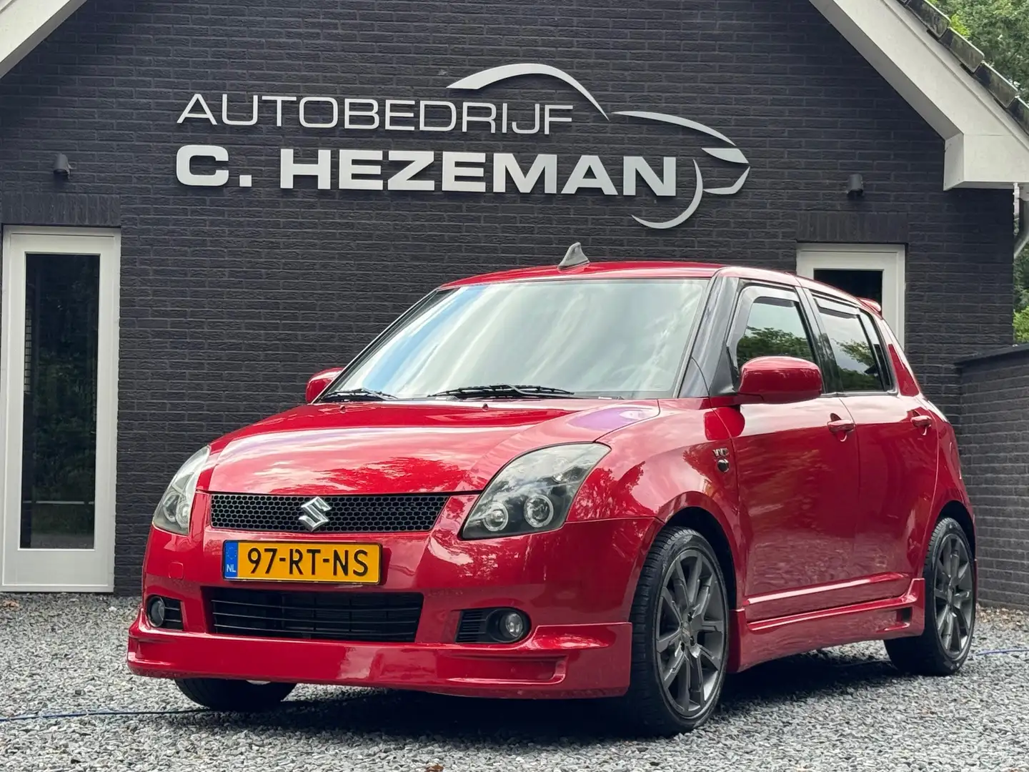Suzuki Swift 1.5 Exclusive Sport Bumpers Spoilers UNIEK Airco M Rood - 1