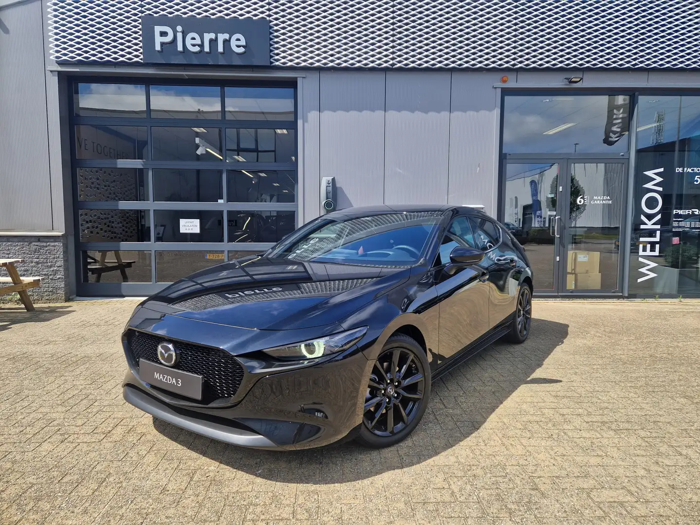 Mazda 3 2.0 e-SkyActiv-X M Hybrid 186 Takumi | Dieprood le Zwart - 2