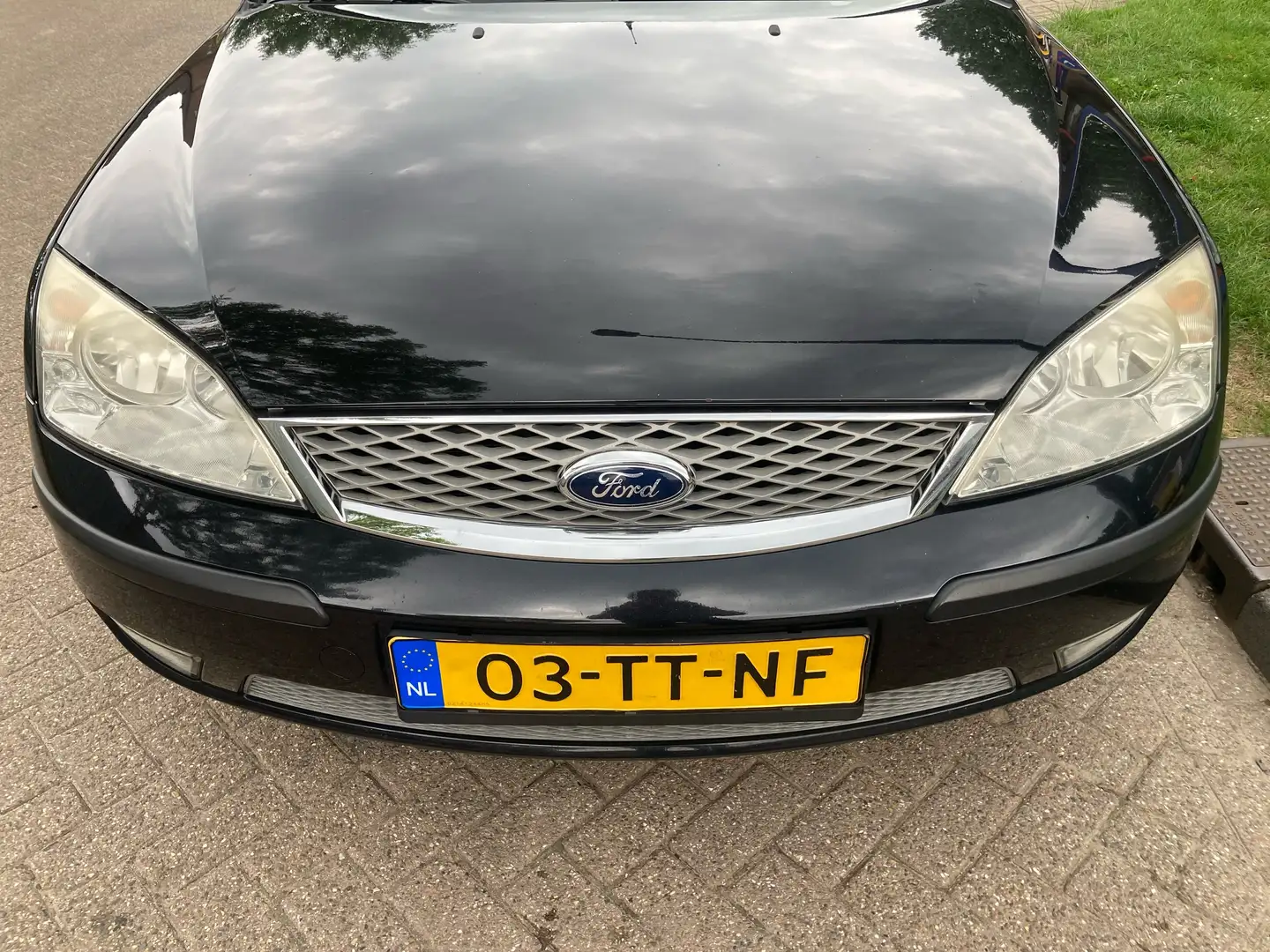 Ford Mondeo 1.8 16V 125pk First Edition AIRCO, TREKHAAK, NIEUW Zwart - 2