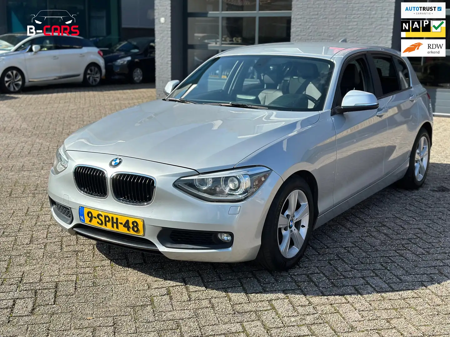 BMW 114 1-serie 114i EDE Upgrade Edition LEER|XENON|STOELV Gris - 1