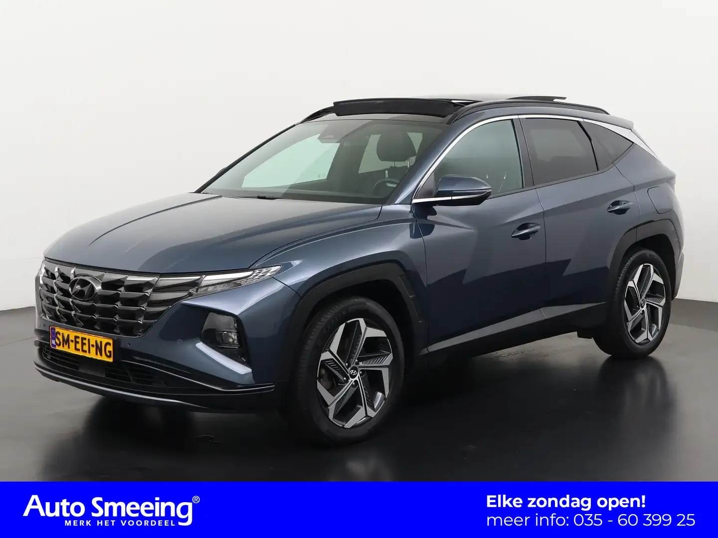 Hyundai TUCSON 1.6 T-GDI HEV Premium Sky | Panoramadak | Trekhaak Blauw - 1