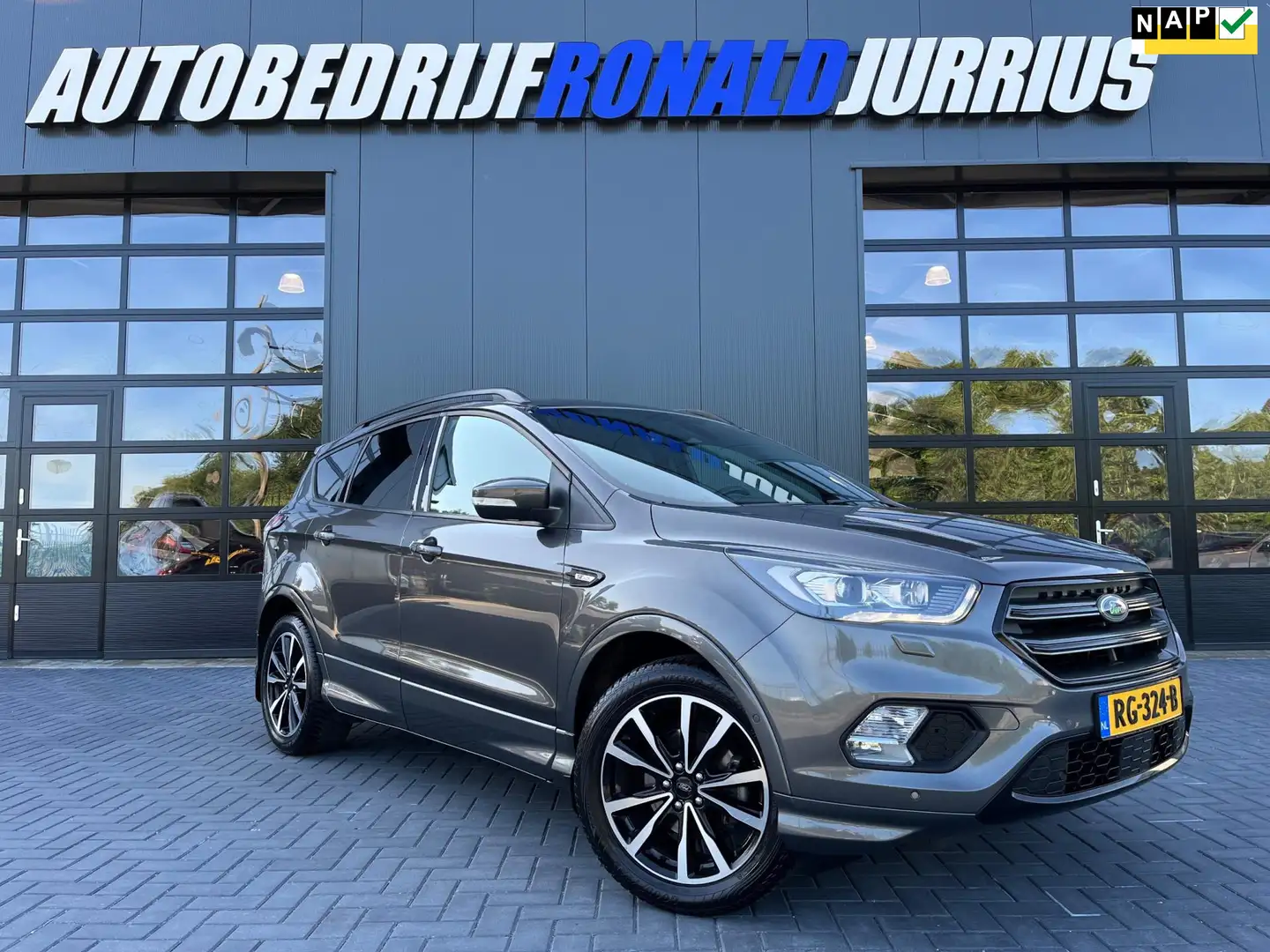 Ford Kuga 1.5 EcoBoost ST Line NL.Auto/Full Opties/Trekhaak/ Grau - 1