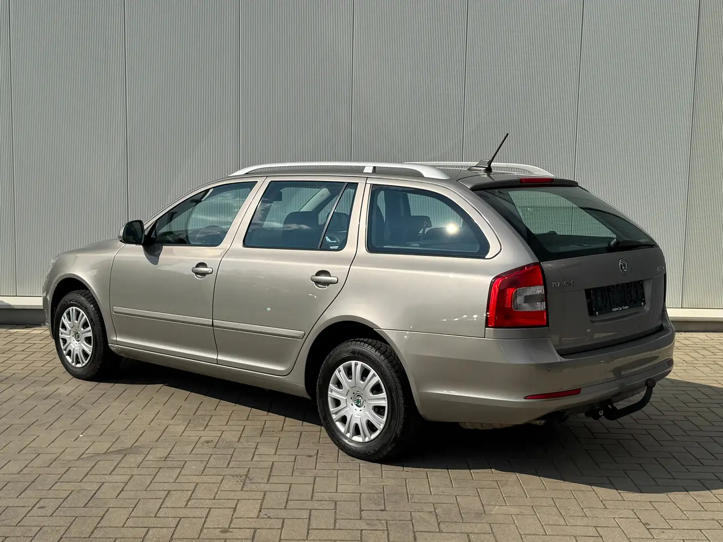 Skoda Octavia ✅1.6 TDI GARANTIE Airco Navi Trekhaak Parksensor Grijs - 2