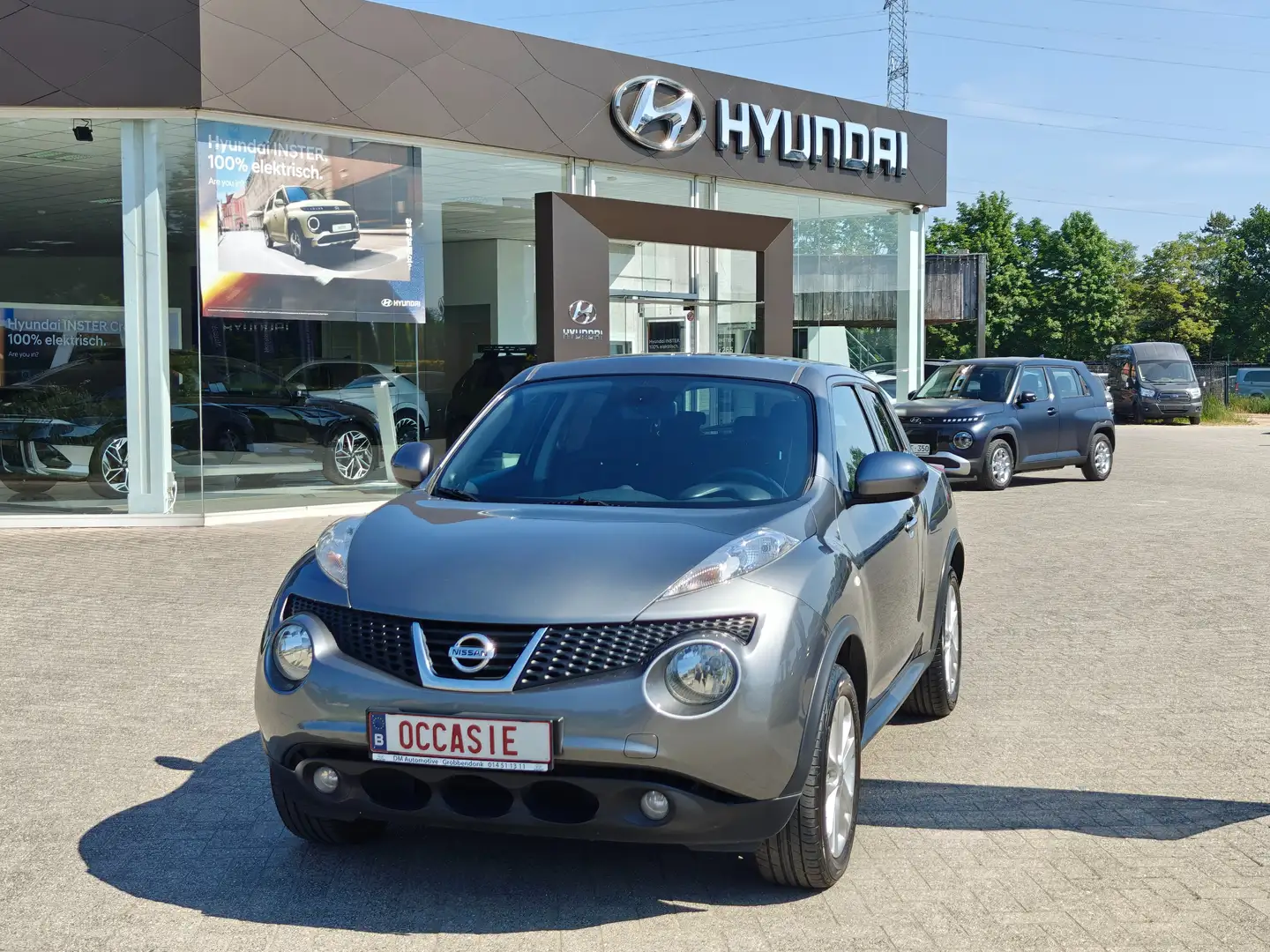 Nissan Juke * 1.6i benzine * navi/gps * onderhoudshistoriek * Gris - 1