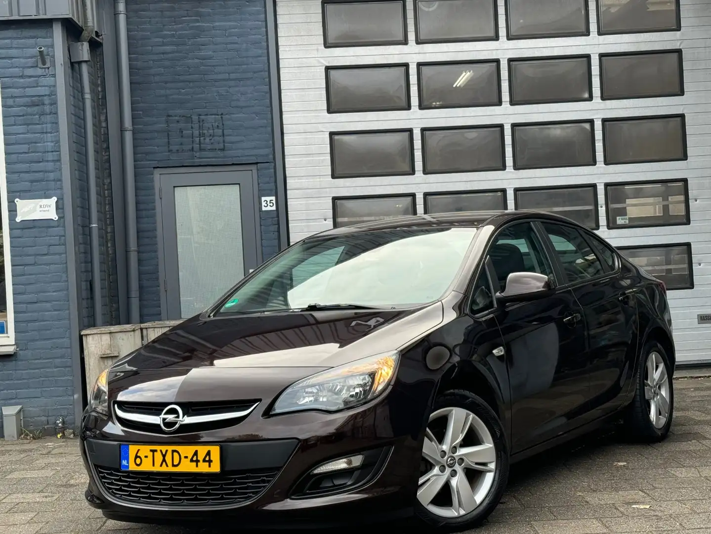 Opel Astra 1.4 Turbo Berlin | Airco | Navi | Cruise | N.A.P Brun - 1
