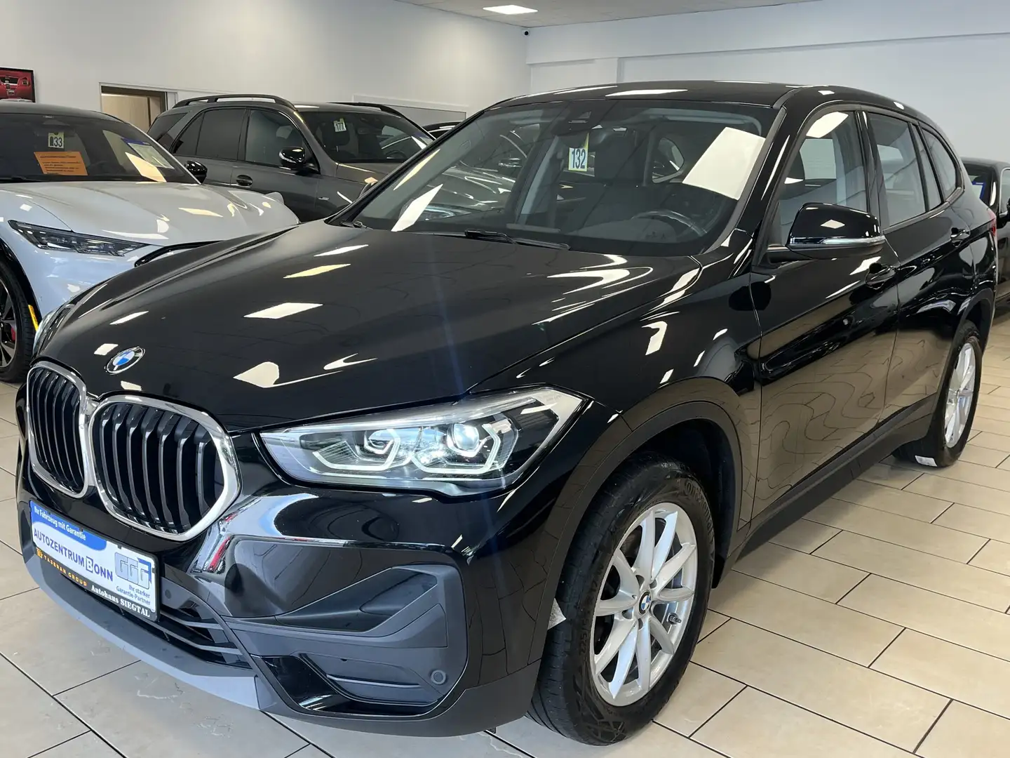 BMW X1 sDrive 18 i*Navi*Cam*SHZ+PDC*BT-Audio*Klima* Noir - 1