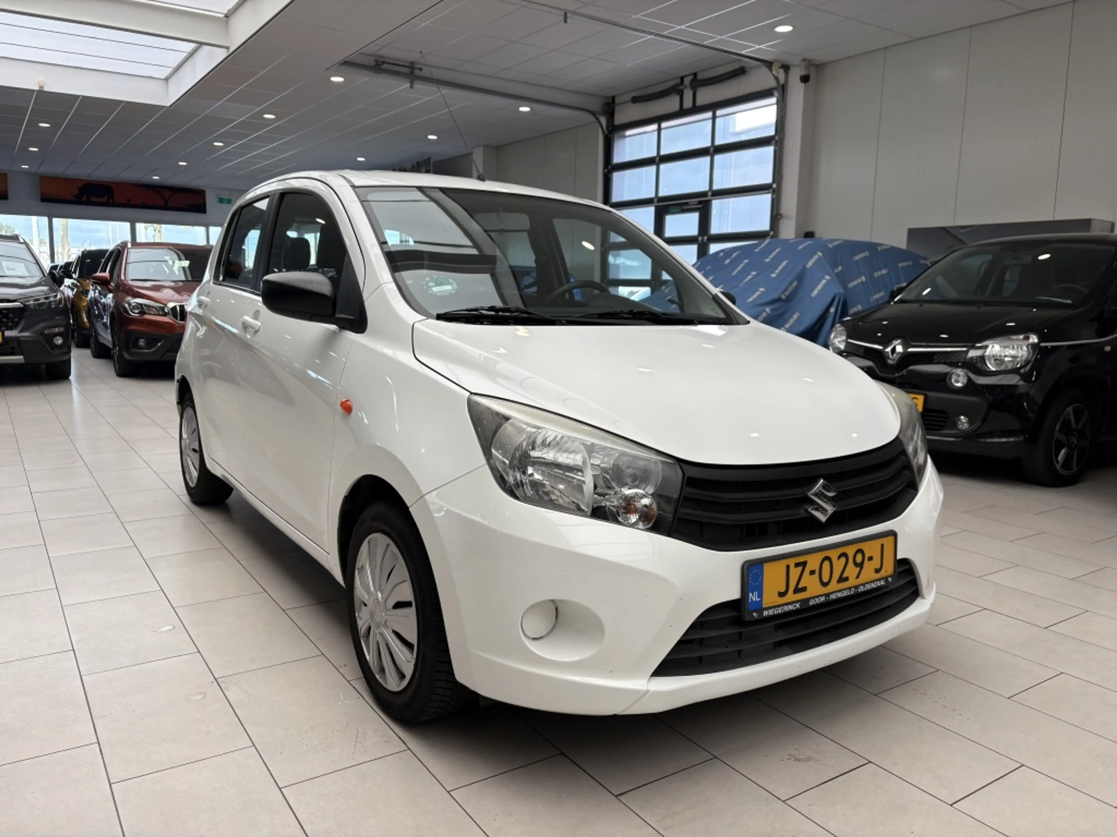 Suzuki Celerio 1.0 Comfort [BLUETOOTH I AIRCO I RADIO I ALL-SEASO — photo 24