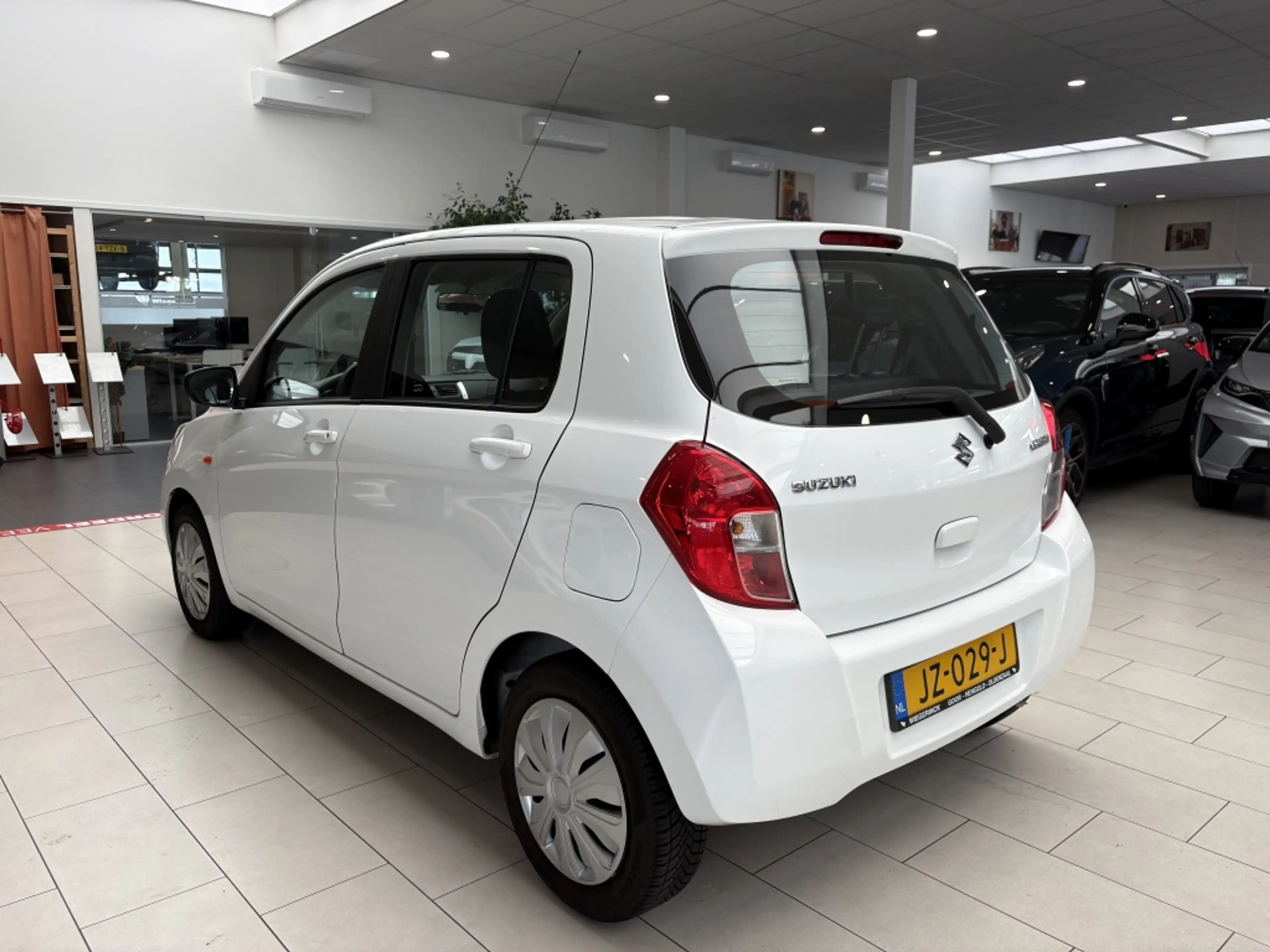 Suzuki Celerio 1.0 Comfort [BLUETOOTH I AIRCO I RADIO I ALL-SEASO — photo 22