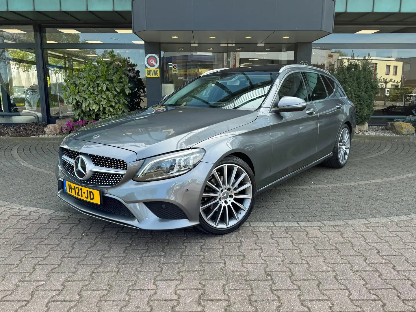 Mercedes-Benz C 180 Estate Panoramadak Multibeam 19 inch AMG Camera Sf Сірий - 1