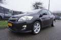 Toyota Auris 1.8 Full Hybrid 136PK 5D CVT Aut Exe Navi LM Thaak Zwart - thumbnail 1