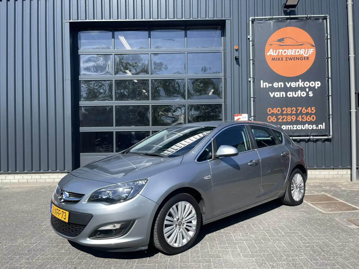 Opel Astra 1.4 Turbo Design Edition NAVIGATIE|TREKHAAK|CAMERA Grau - 1
