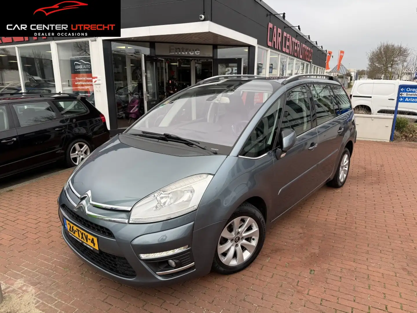 Citroen Grand C4 Picasso 1.6 THP Selection 7p navi automaat airco 130dkm!! Gris - 1