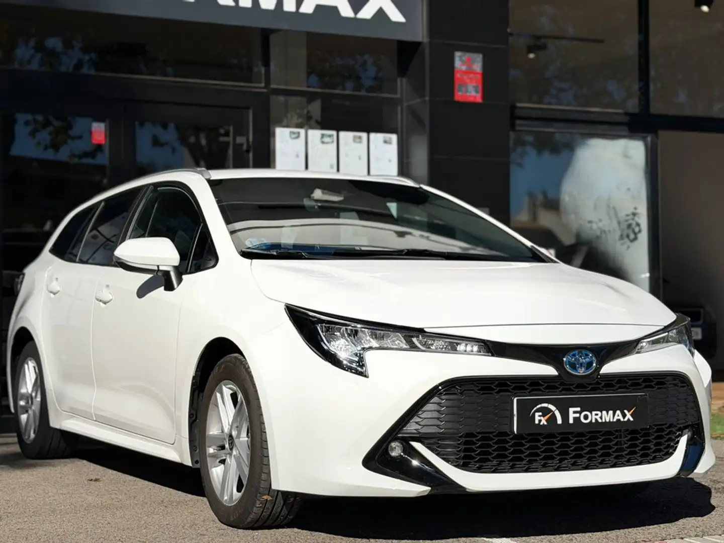 Toyota Corolla 1.8 125H ACTIVE TECH E-CVT TOU SPORT Blanco - 2