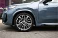 BMW X1 sDrive20i High Executive M Sport Automaat / Panora Grijs - thumbnail 16