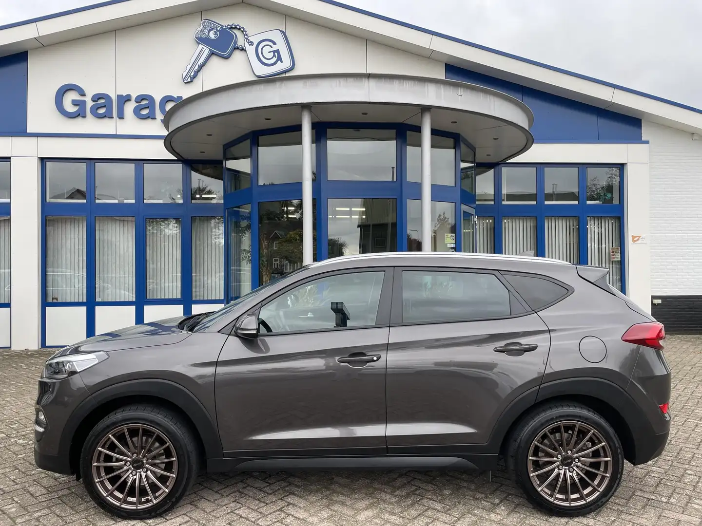 Hyundai TUCSON 1.6 GDi Premium | Dealer onderhouden, Navigatie, C Gris - 2