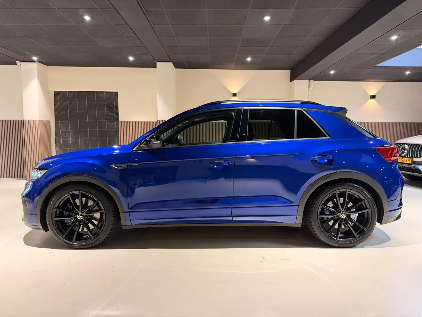 Volkswagen T-Roc 2.0 TSI 4Motion R 300PK Pano|Beats|Camera|Blind|AC Blauw - 2