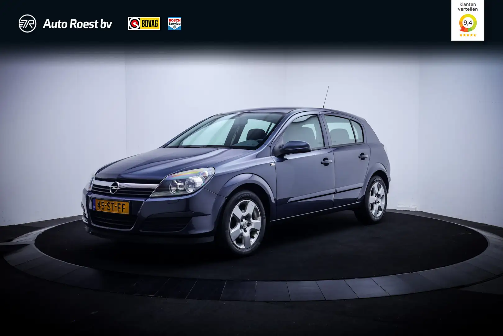 Opel Astra 1.4 5 Drs Edition 2e EIG! AIRCO | CRUISE | ELEK PA Grijs - 1