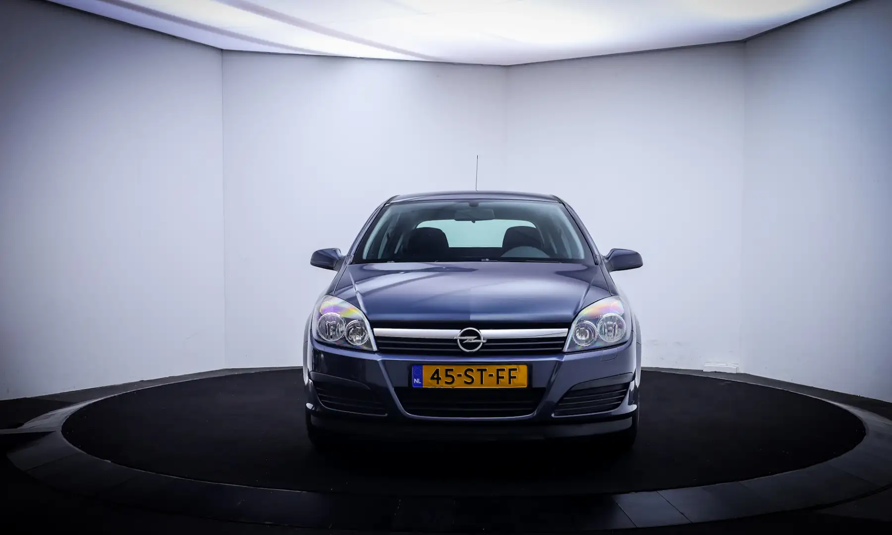 Opel Astra 1.4 5 Drs Edition 2e EIG! AIRCO | CRUISE | ELEK PA Grijs - 2