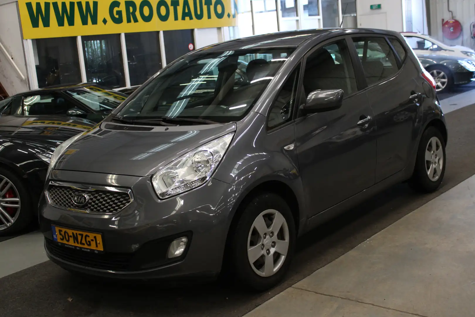 Kia Venga 1.4 CVVT X-tra Airco, Cruise Control, Isofix, Stuu Gris - 1