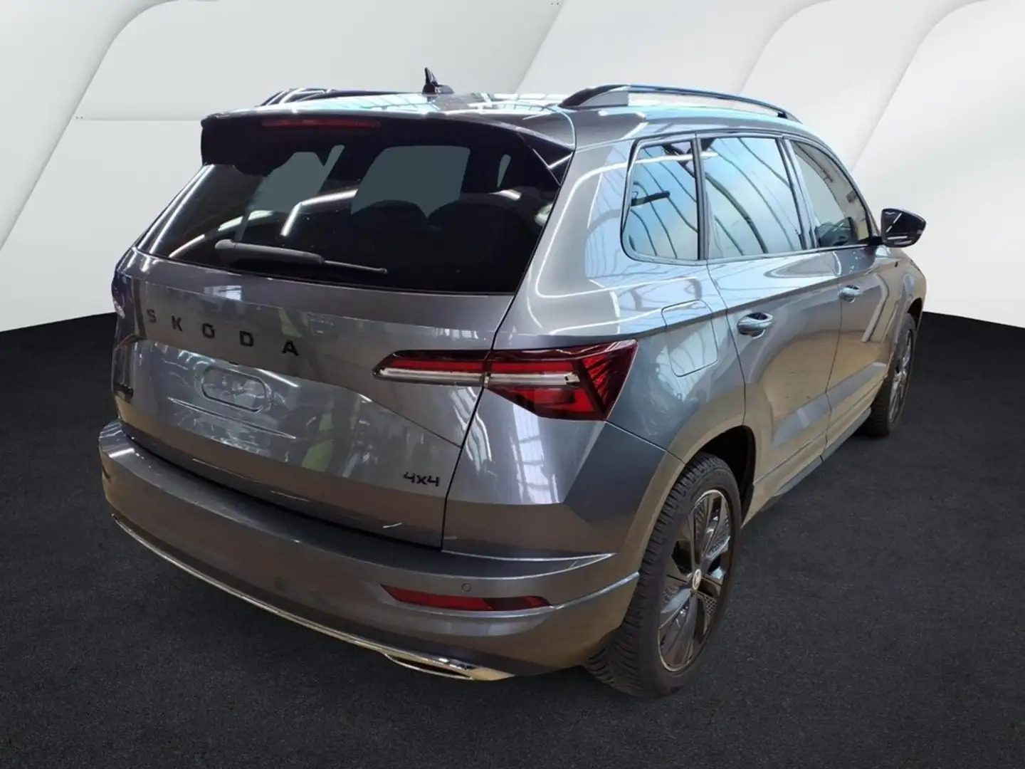 Skoda Karoq 2.0 TSI DSG 4x4 Sportline AHK, Pano Grau - 2