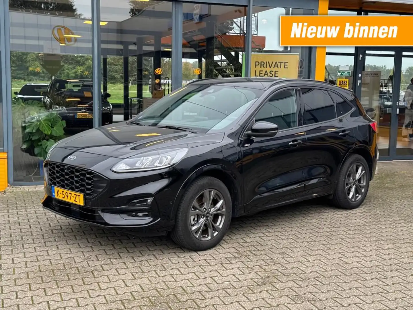 Ford Kuga 2.5 PHEV ST-Line - navi - camera - adap cruise - d Zwart - 1