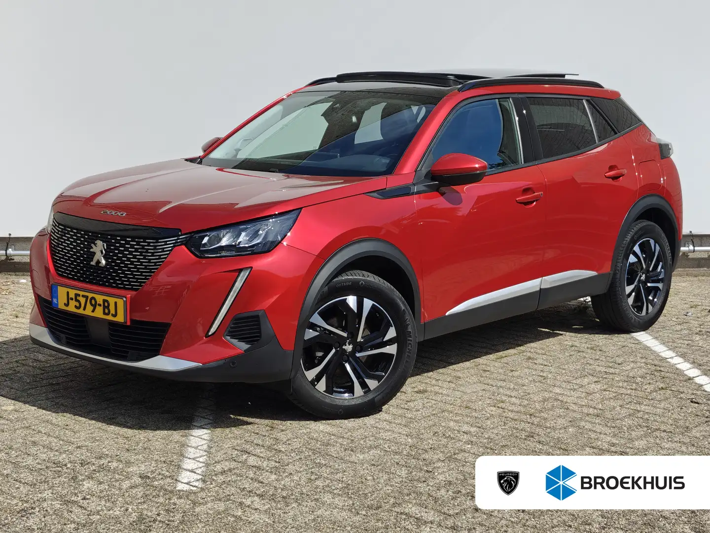 Peugeot 2008 1.2 PureTech Allure | Achterbank in delen neerklap Rouge - 1