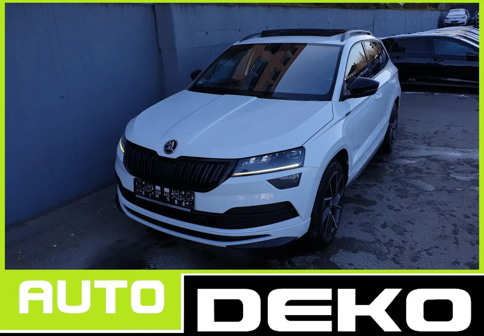 Skoda Karoq 2.0l TDI DSG 4x4 SPORTLINE Pano/AHK/19 Weiß - 1