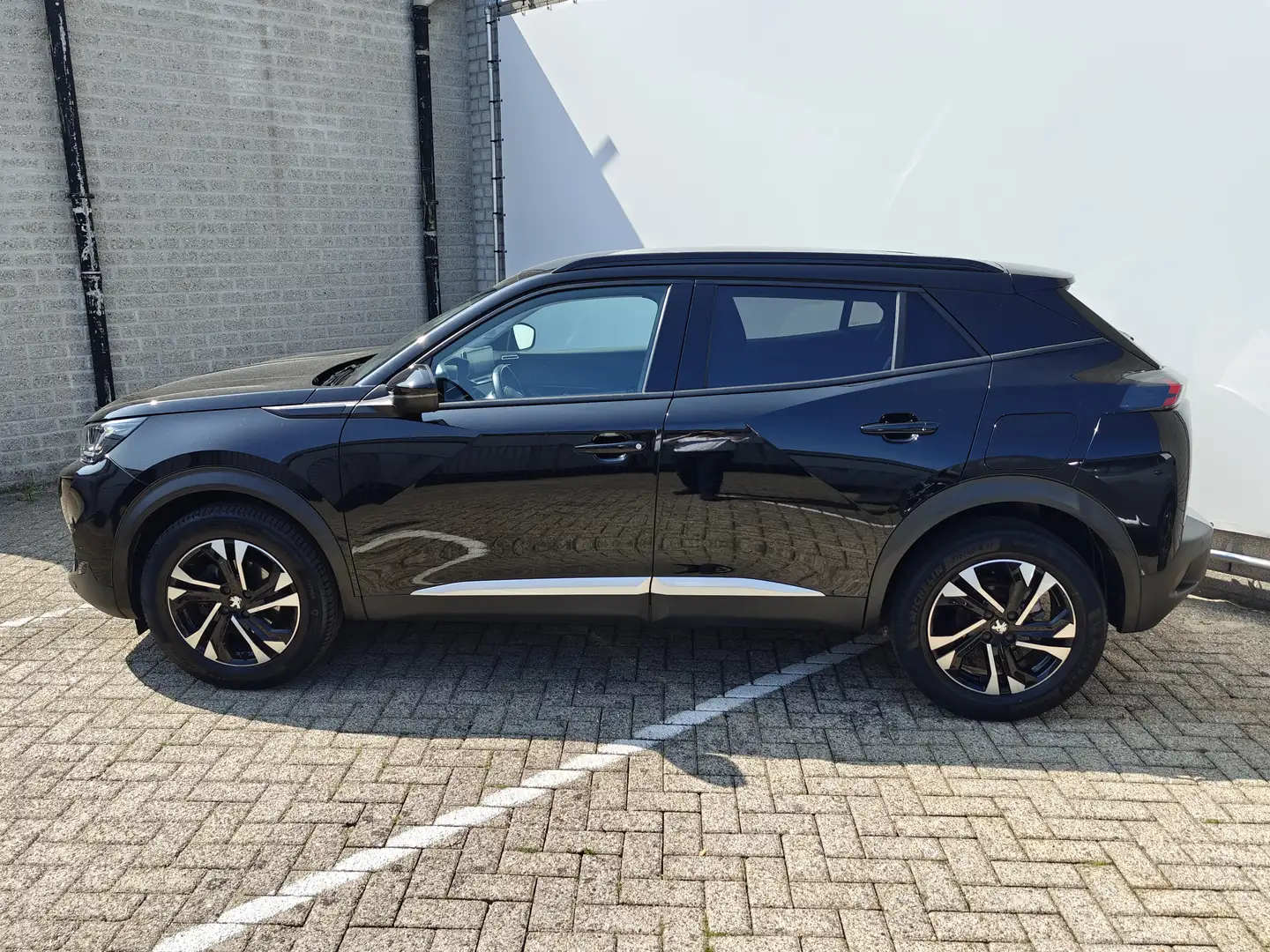 Peugeot 2008 1.2 PureTech Allure | Achteruitrijcamera | Airco ( Zwart - 2