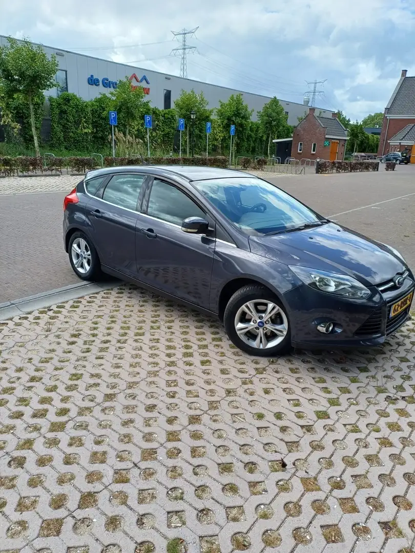Ford Focus 1.8 Style+ Grijs - 1
