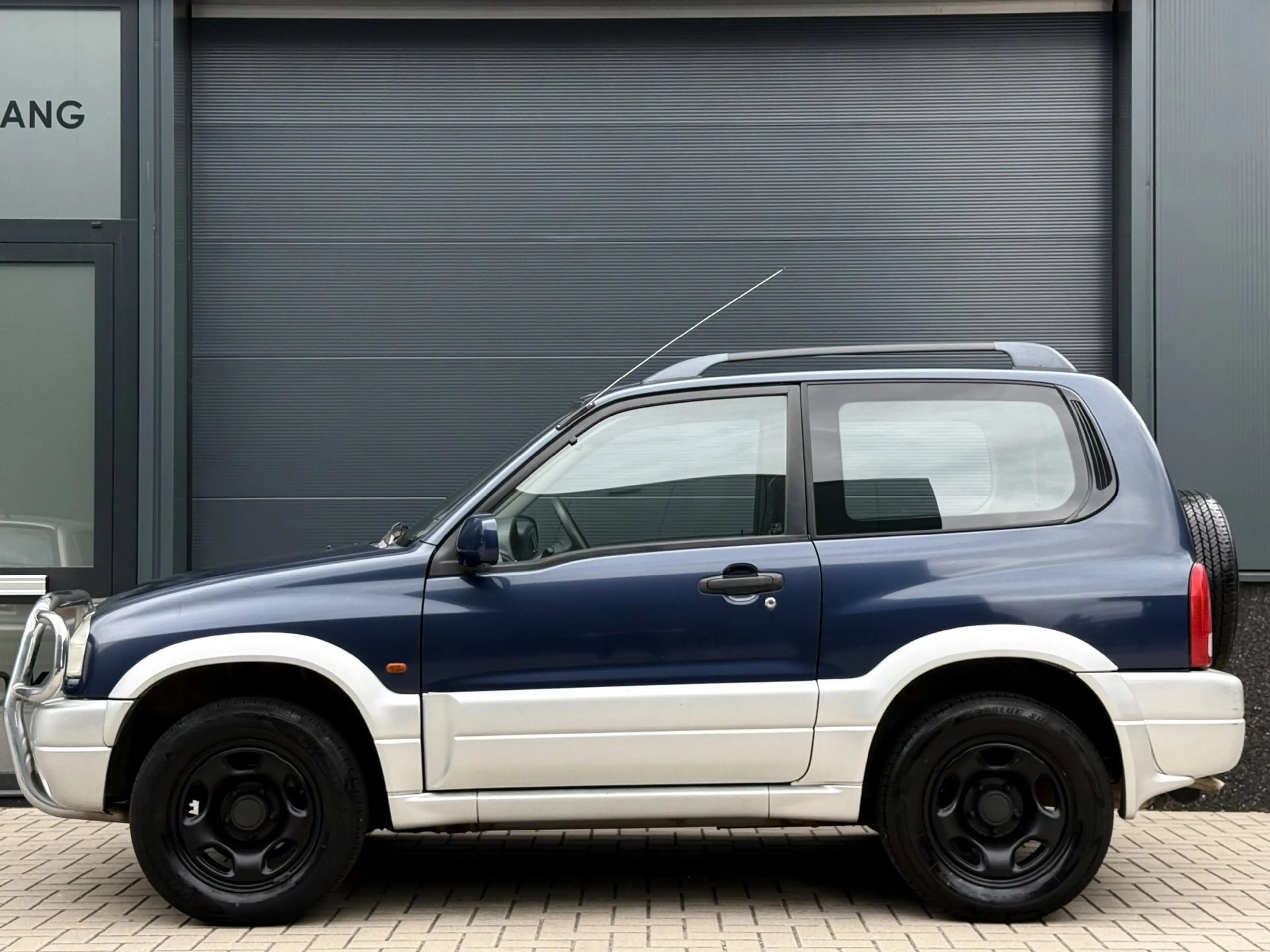 Suzuki Grand Vitara 2.0 Metal Top — photo 5