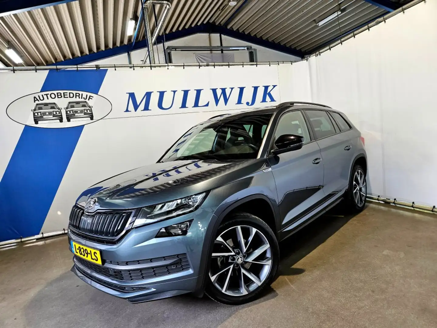 Skoda Kodiaq 1.5 TSI Sportline Business / Trekhaak / Pano / NL Grijs - 2