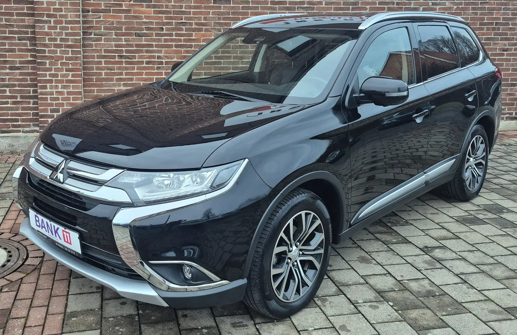 Mitsubishi Outlander Top 4WD 7-Sitzer/AHK/ACC/Leder/SHZ/LHZ/Navi/RF-Kam Schwarz - 1