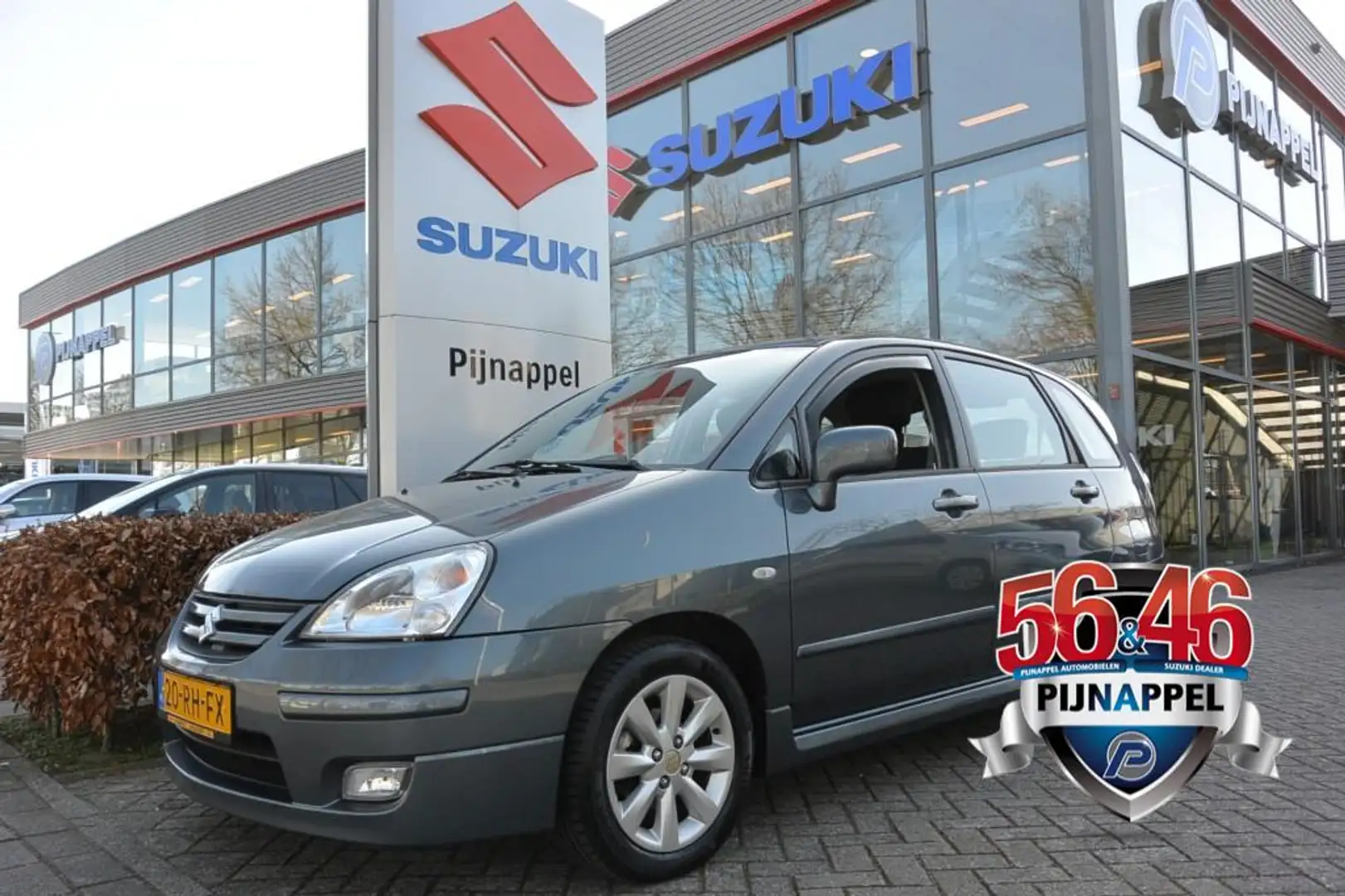 Suzuki Liana 1.6 Exclusive Automaat 5-deurs Airco / Trekhaak Grigio - 1