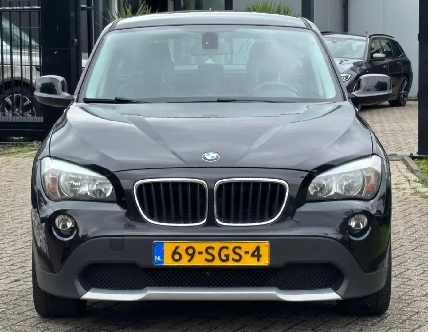 BMW X1 1.8D S-Drive Executive 2011 Zwart Trekhaak Zwart - 2