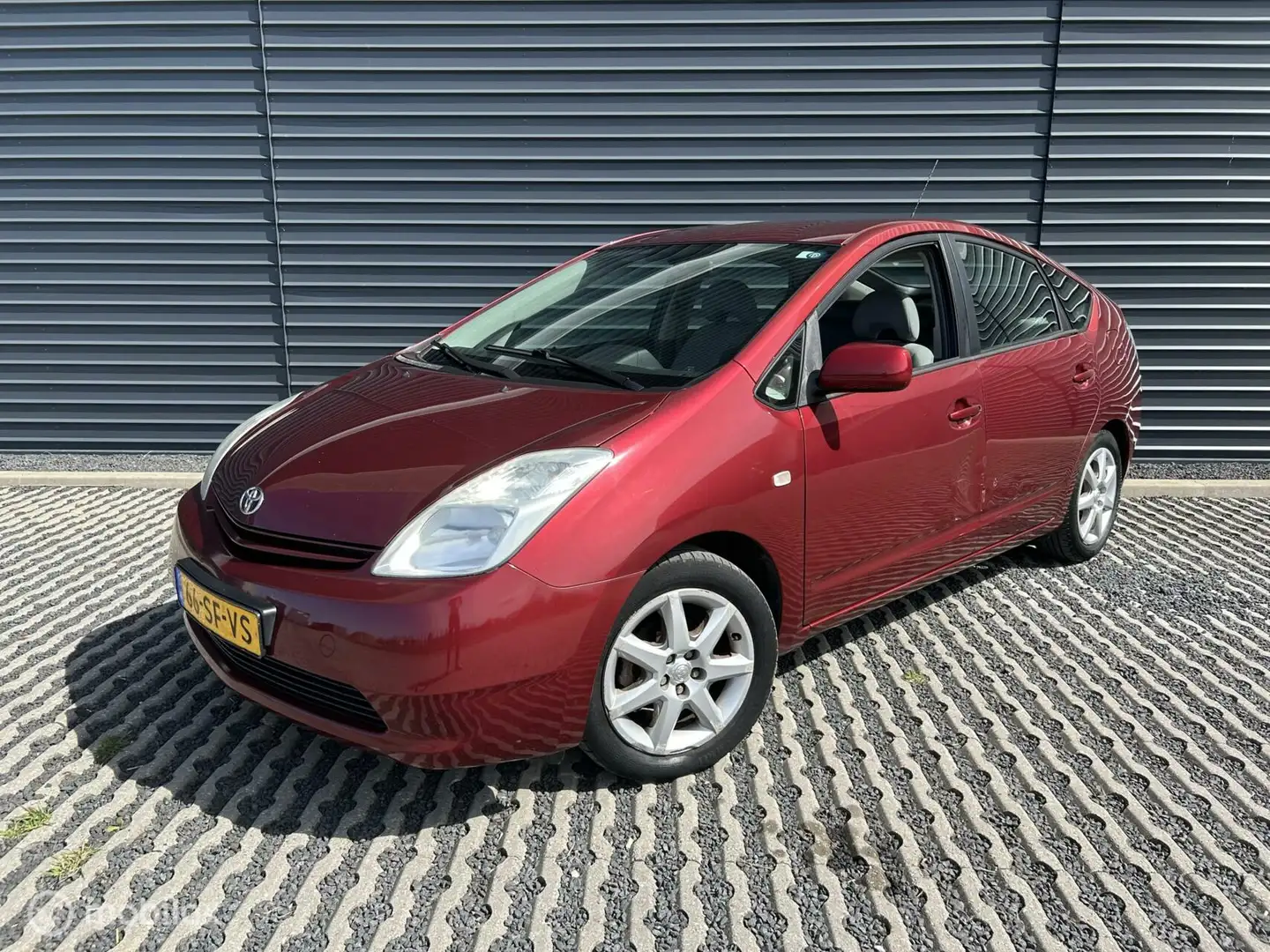 Toyota Prius 1.5 VVT-i Automaat| Airco | Navi | Nieuwe accu! Rouge - 1