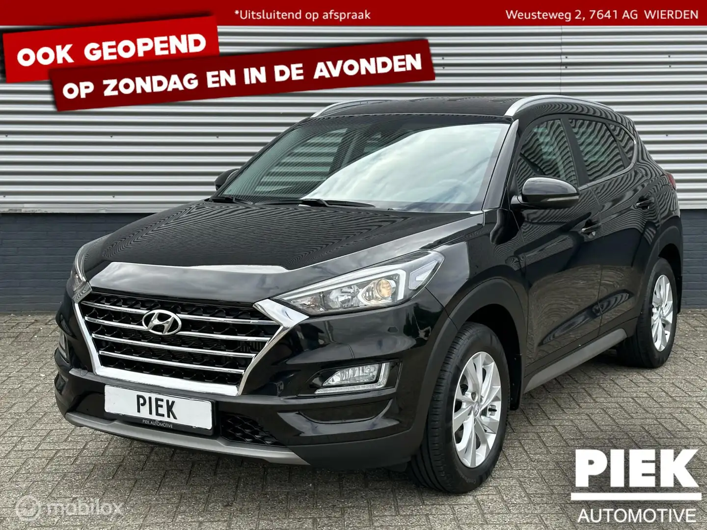 Hyundai TUCSON 1.6 T-GDI Premium AUTOMAAT NIEUWSTAAT Zwart - 1