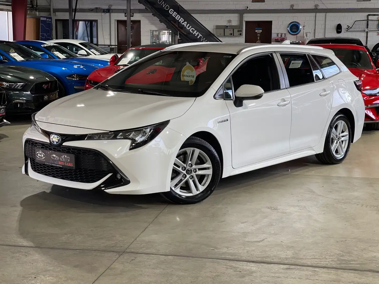 Toyota Corolla TOURING SPORTS HYBRID BUSINESS+8FACH+SHZ+GARANTI Wit - 1