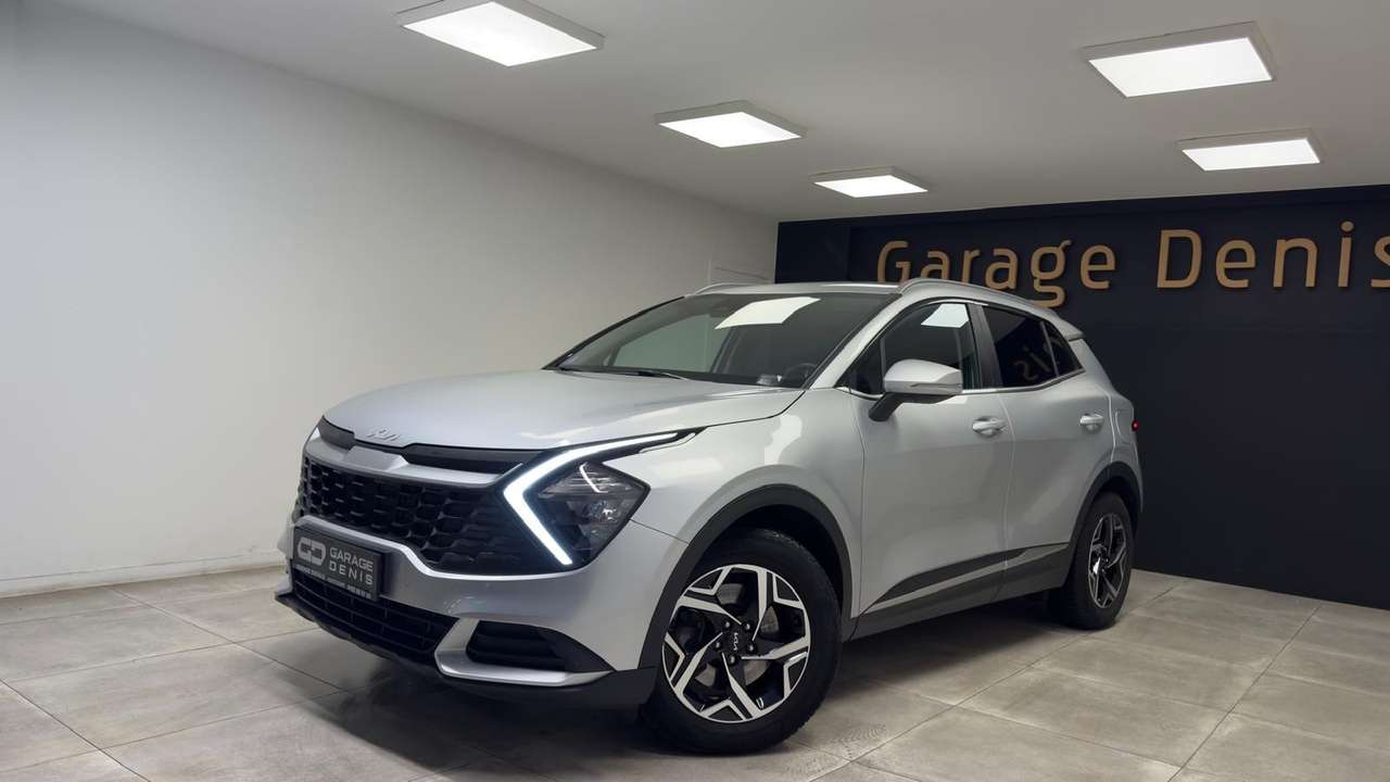 Kia Sportage — photo 1
