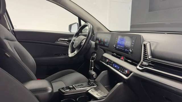 Kia Sportage — photo 13