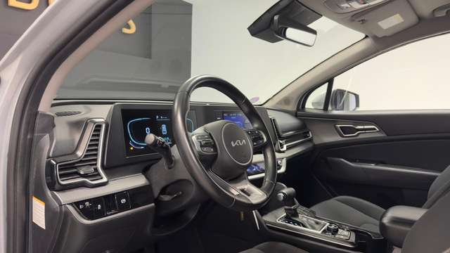 Kia Sportage — photo 14