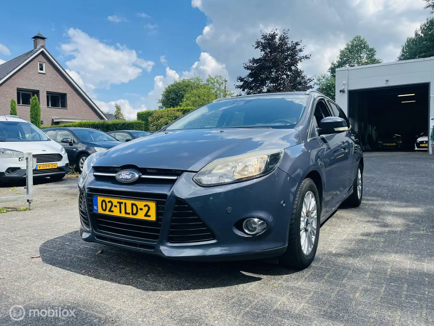 Ford Focus Wagon 1.6 150PK EcoBoost Titanium Clima / LM / Aud Grijs - 1