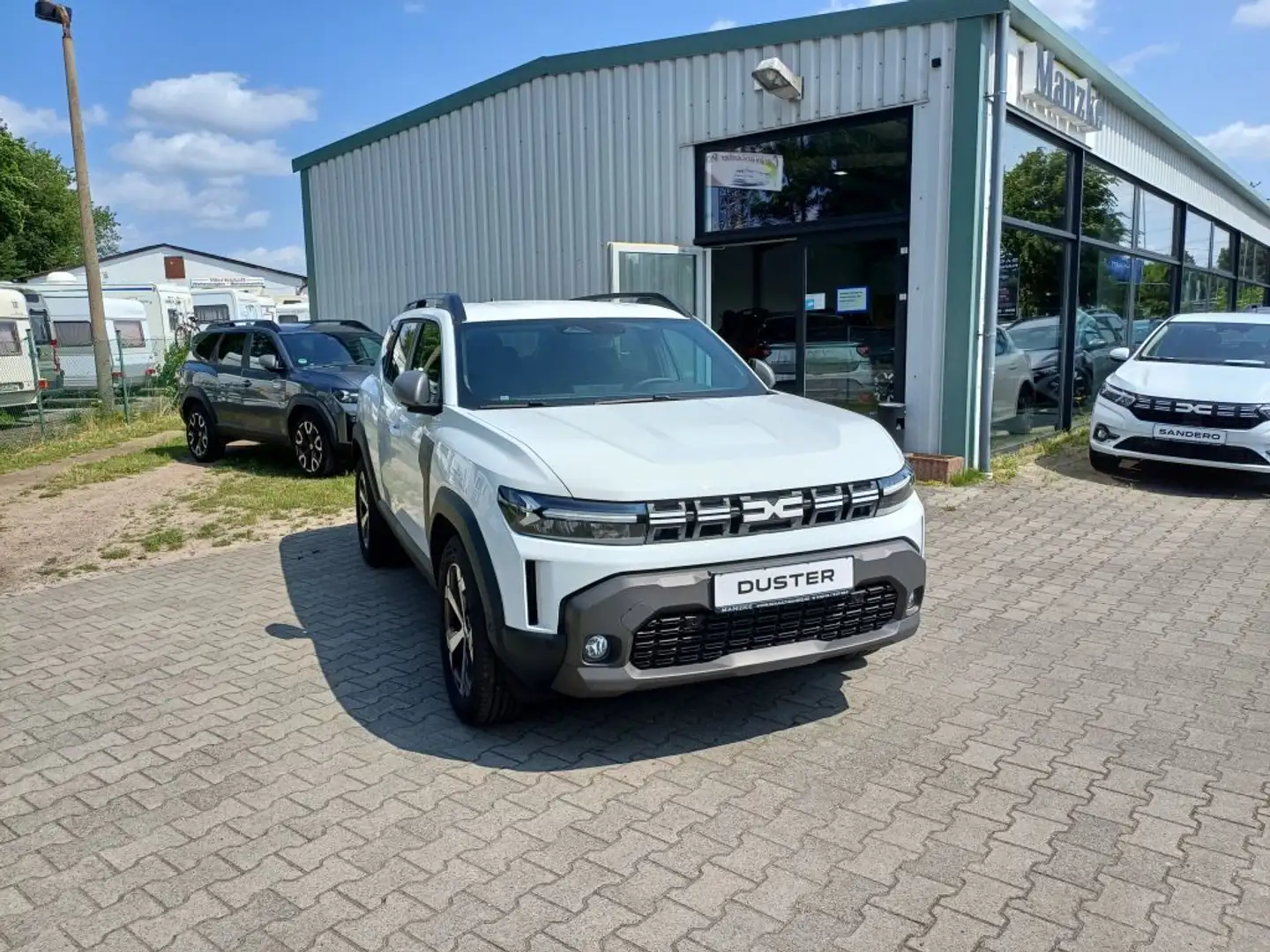 Dacia Duster Hybrid 140 Journey Weiß - 1