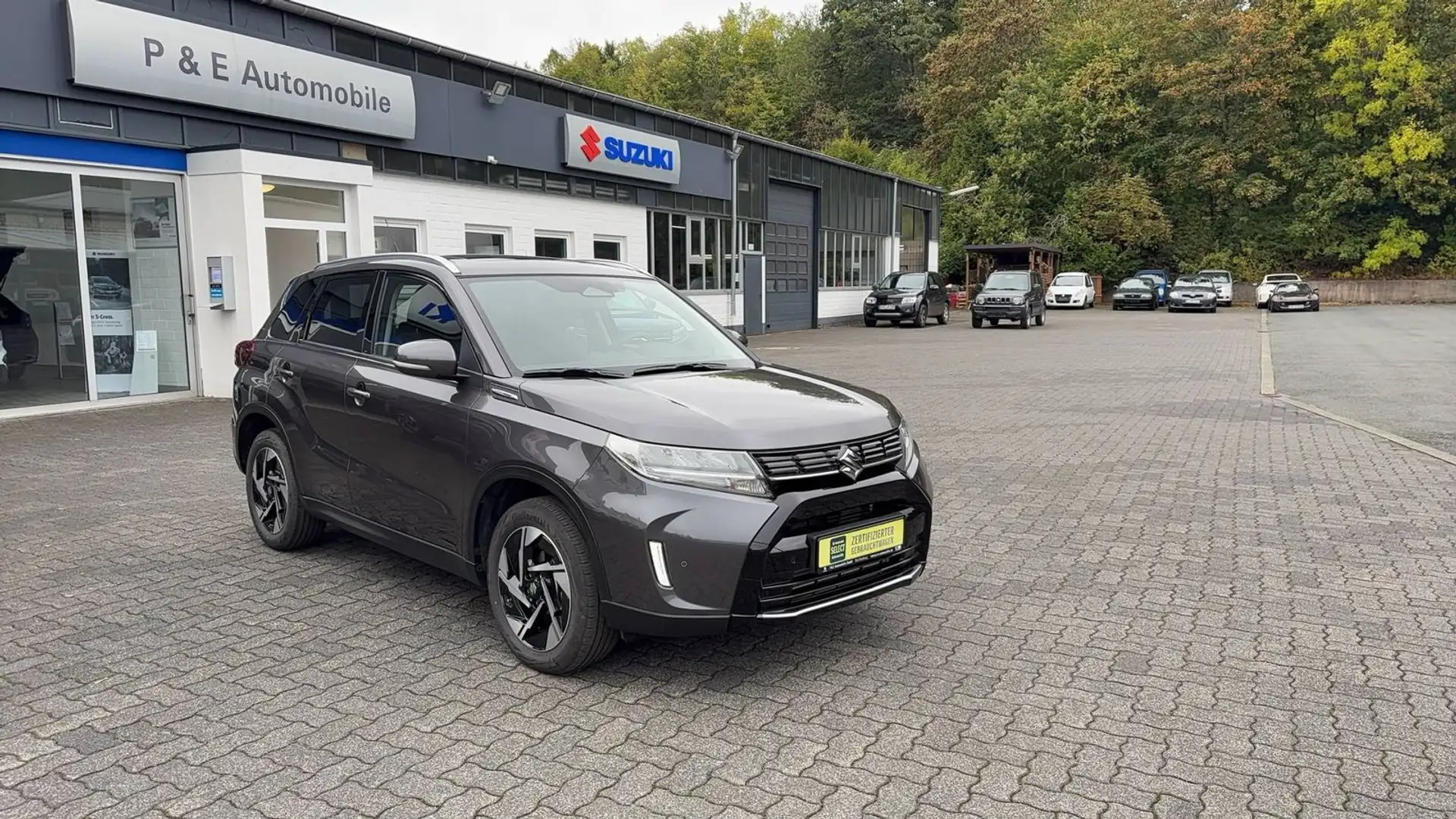 Suzuki Vitara 1,4 4x4 Comfort+ Hybrid*5 Jahre Garantie* Gris - 1