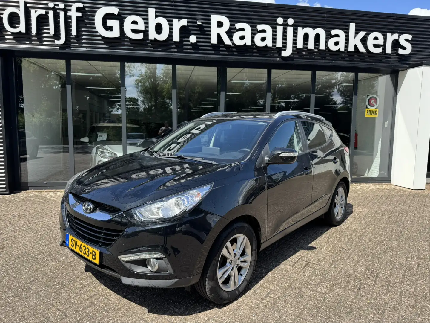 Hyundai iX35 1.6i GDI Business Edition*ECC*Navi*EXPORTPRIJS* Zwart - 1